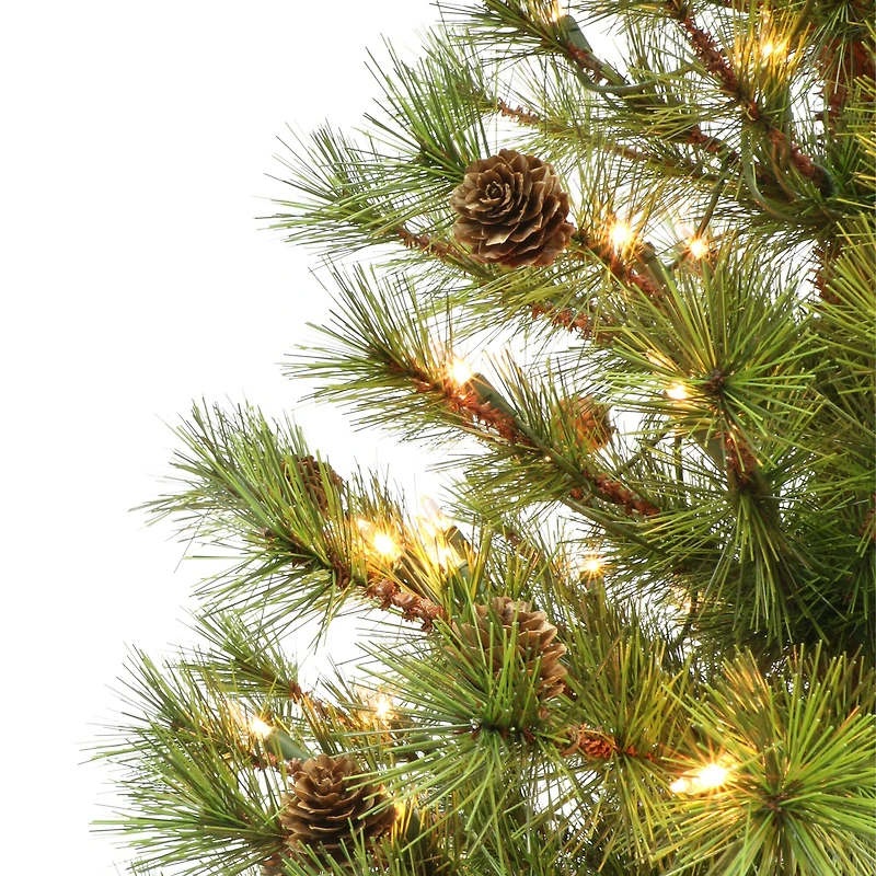 4ft. Pre-Lit Spruce Artificial Potted Christmas Tree in Rattan Base, Clear Lights