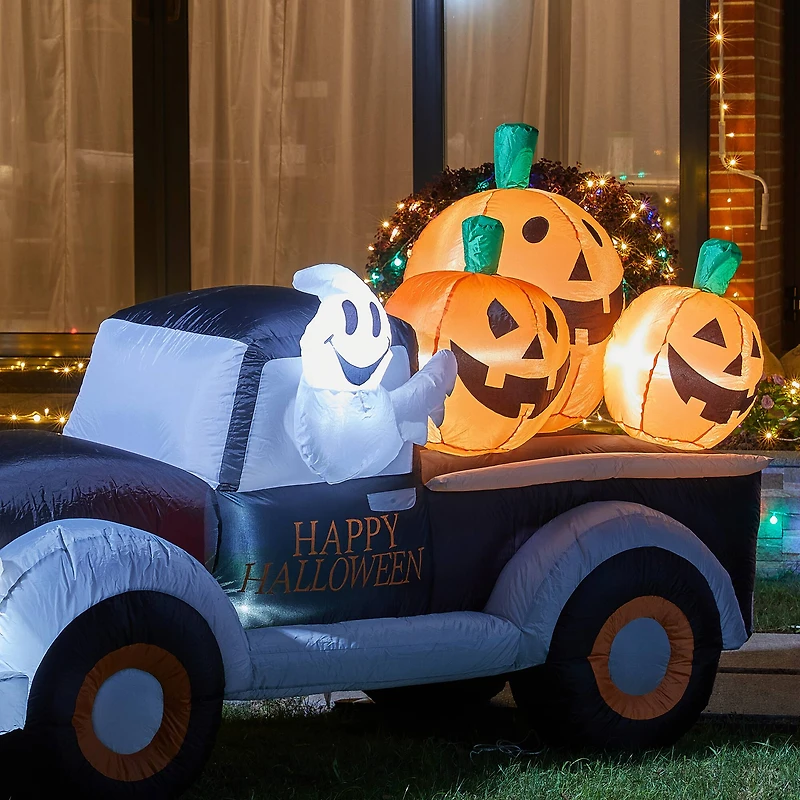 Glitzhome® 8ft. Lighted Inflatable Truck With Jack-O-Lantern Pumpkins Décor