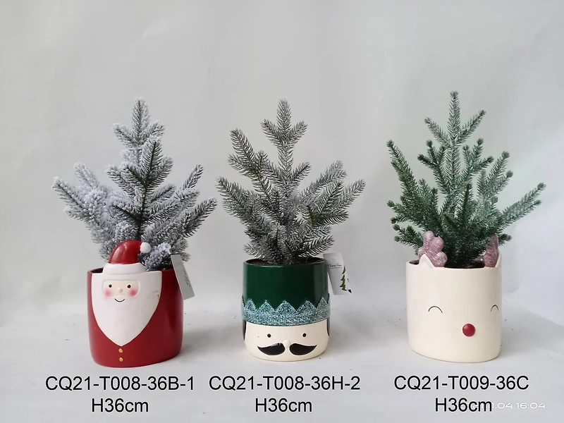 14.75" Unlit Lightly Frosted Mini Christmas Tree in Green Nutcracker Ceramic Pot