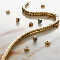 Gold Hematite Heishi Beads by Bead Landing