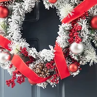 Glitzhome® 24" Flocked Berry, Pinecone & Ribbon Wreath