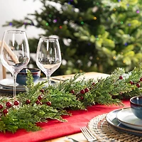 Glitzhome® 6ft Christmas Greenery PE Cedar Garland with Red Berries, 2ct.