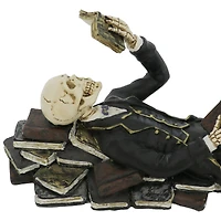 8" Lying Skeleton with Book Tabletop Décor by Ashland®