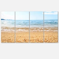 Designart - Blue Seashore with Pebble Stones