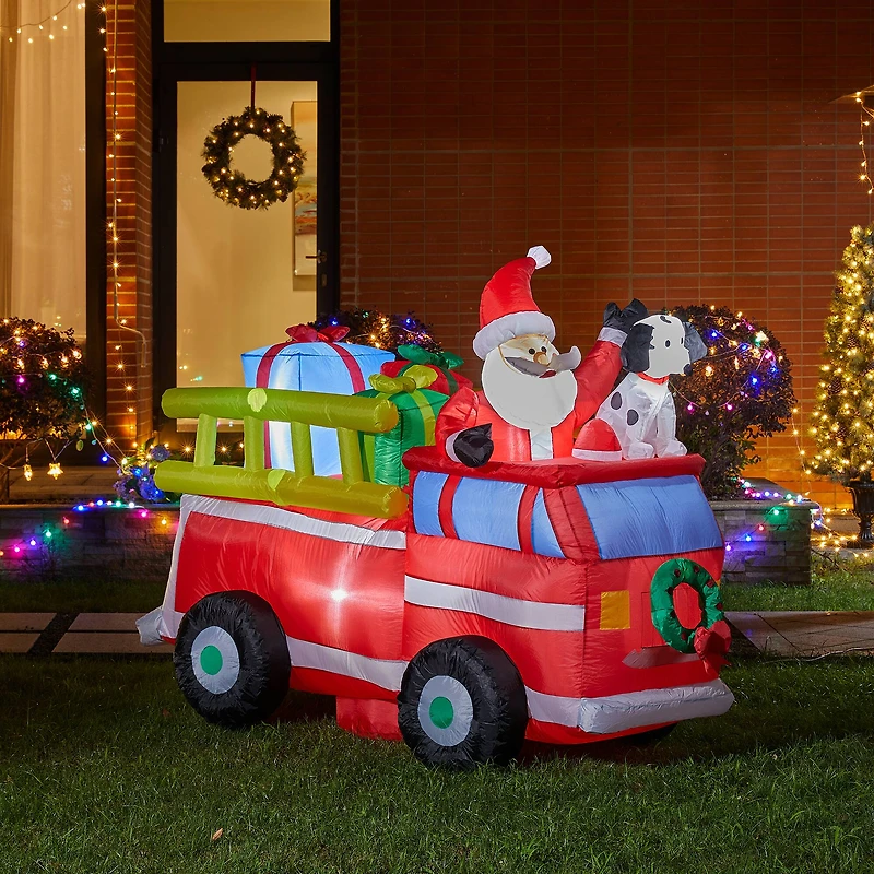Glitzhome® 7ft. Inflatable Santa in Truck With Lights