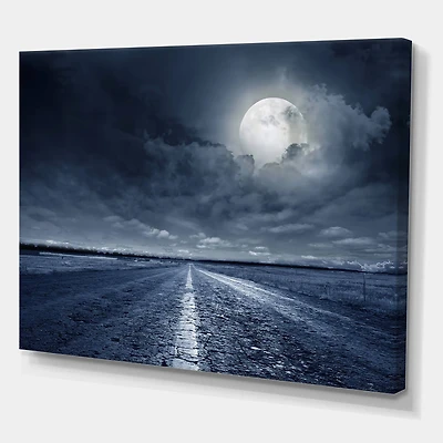 Designart - Asphalt Road Under Cloudy Full Moon I