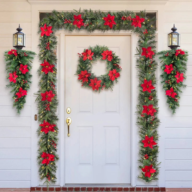 Glitzhome® 9ft. Pre-Lit Greenery Pine Poinsettia and Berries Christmas Garland with LED Lights and Timer