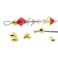 The Beadsmith® Basic Elements™ Gold-Plated Stardust Crimp Tubes & 4mm Covers