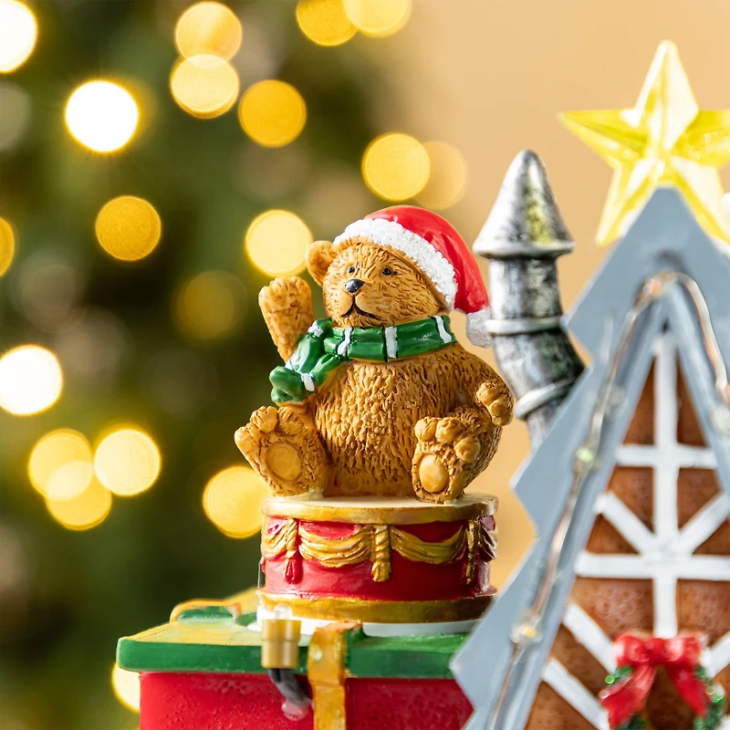 Glitzhome® 10.75" Lighted CHRISTMAS TOY MARKET Resin Village with Movement and Music