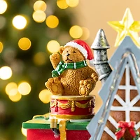 Glitzhome® 10.75" Lighted CHRISTMAS TOY MARKET Resin Village with Movement and Music