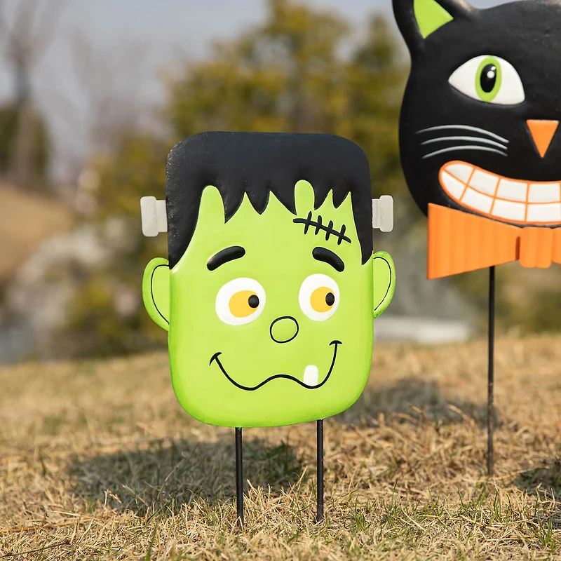 Glitzhome® 3.5ft. Halloween Metal Stacked Ghost, Frankenstein, Black Cat and Pumpkin Yard Stake