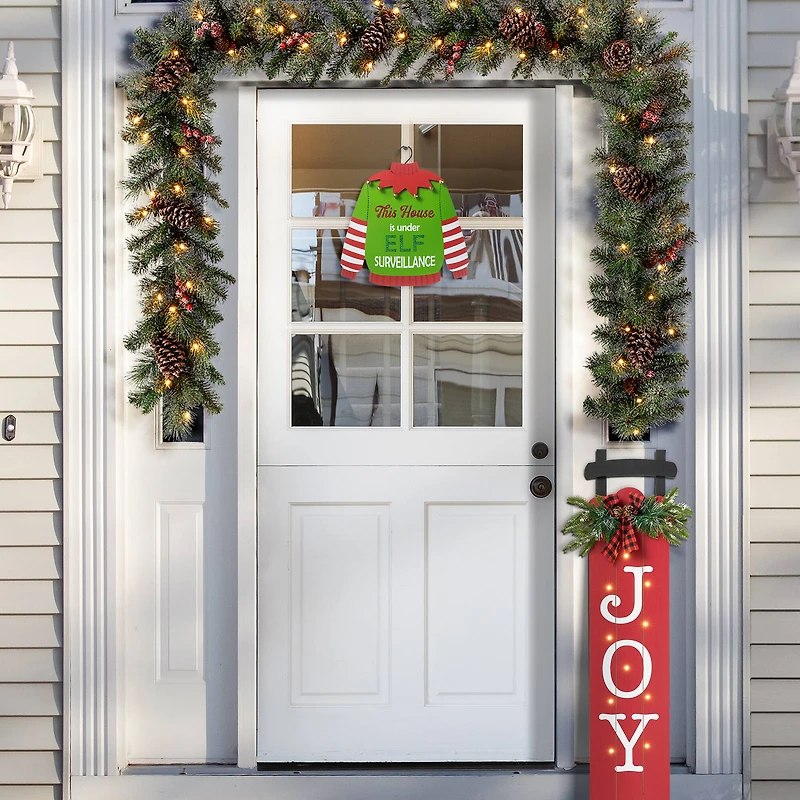 Glitzhome® 13.25" Christmas Elf Sweater Sign Door Hanger