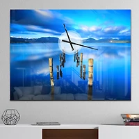 Designart 'Wooden Pier Remains In Blue Sea Modern Rectangular Wall Clock