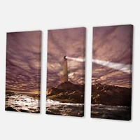 Designart - Lighthouse Shining Light During Stormy Night I