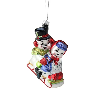 4.5" White & Red Cheerful Sledding Snowmen Couple Glass Christmas Ornament