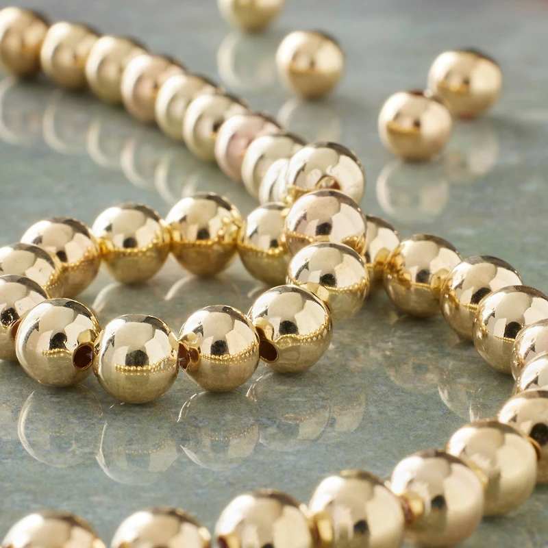 12 Pack: Gold Metal Round Beads, 6mm by Bead Landing™