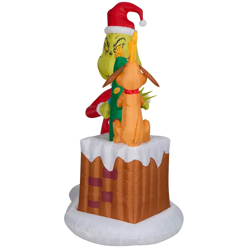 6.5ft. Animated Airblown® Inflatable Christmas Grinch Pulling Tree from Chimney