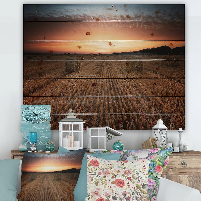 Designart - Landscape With A Field Full of Hay Bales At Sunset