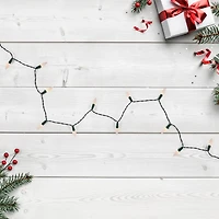 Battery Operated LED C6 Faceted Christmas Lights - Warm White  - 15.75' Green Wire  - 50ct