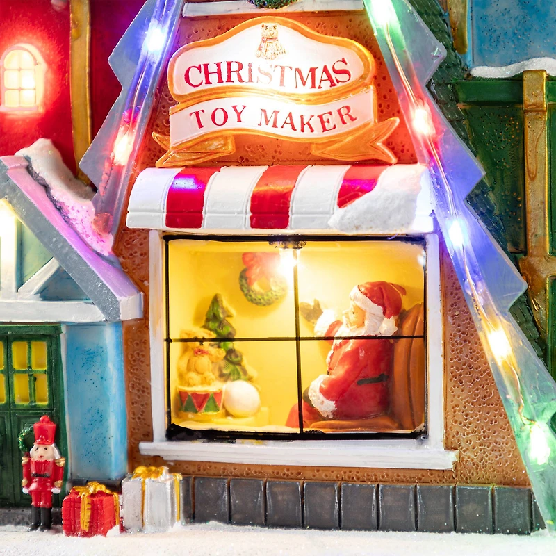 Glitzhome® 10.75" Lighted CHRISTMAS TOY MARKET Resin Village with Movement and Music