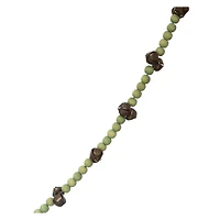 Hello Honey® 6ft. Green Paulownia Wood Beads & Jingle Bells Garland