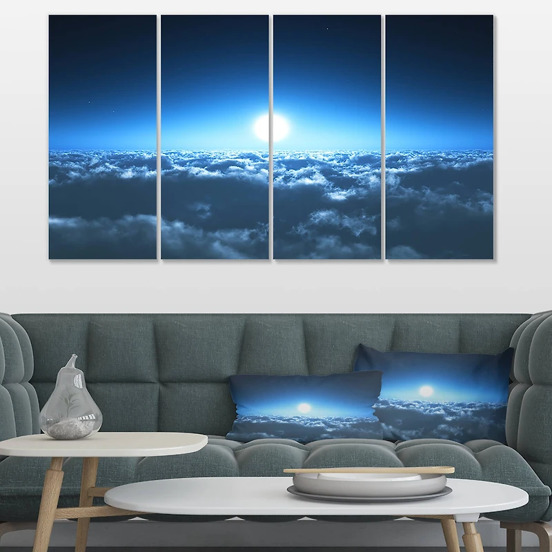 Designart - Night Flight above Clouds