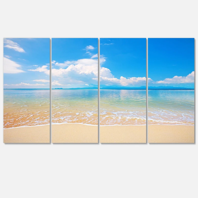 Designart - Large Clouds Over Calm Beach