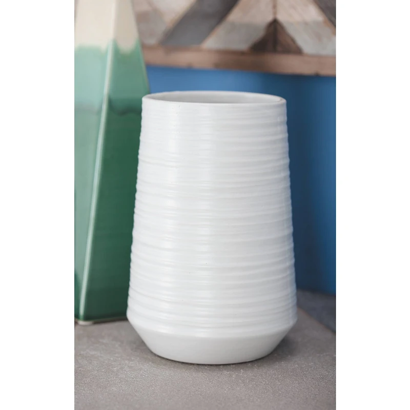 CosmoLiving by Cosmopolitan 7" White Porcelain Contemporary Vase