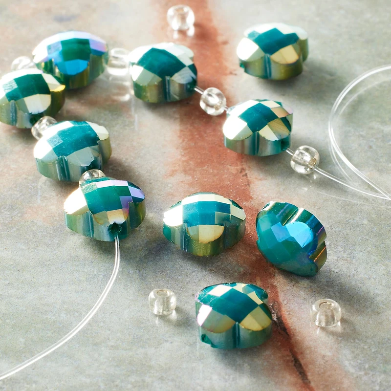 12 Pack: 12mm Turquoise Glass Cross Faceted Beads by Bead Landing™