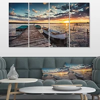 Designart - Boats and Jetty under Dramatic Sky