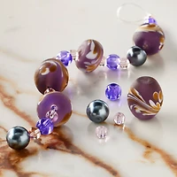 12 Pack: Purple Lampwork Glass Swirl Rondelle & Oval Beads by Bead Landing™