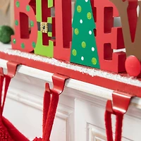 Glitzhome® 14.5'' BELIEVE Metal Christmas Stocking Holder