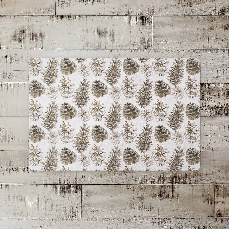 Pinecones on White Floor Mat