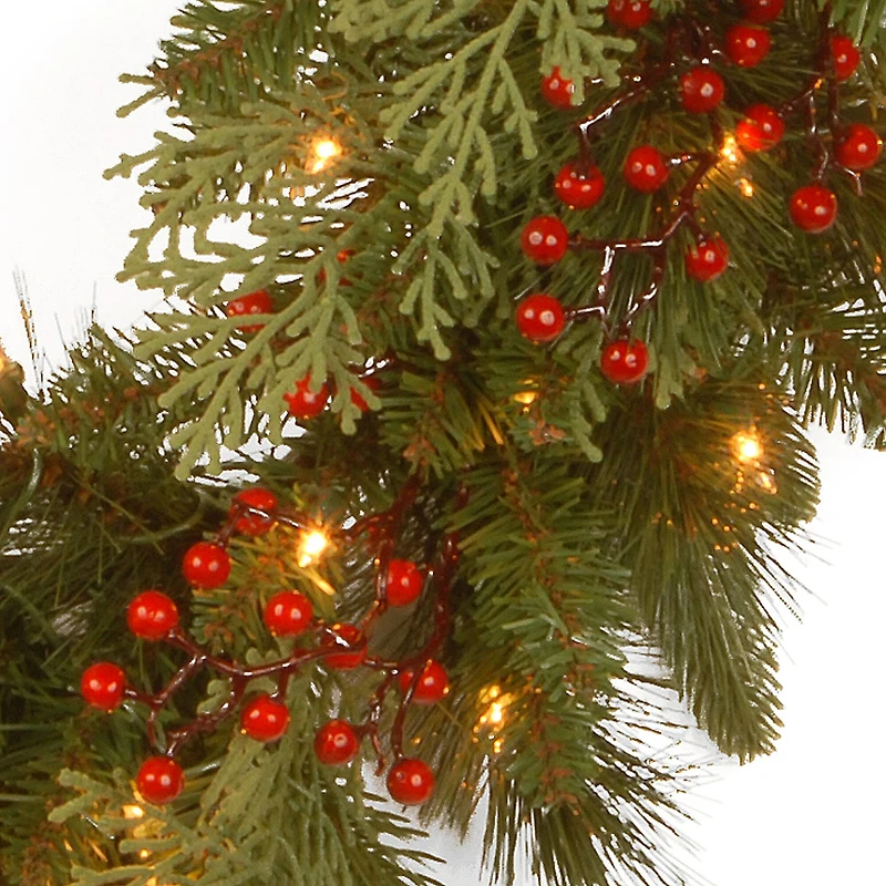 24" Feel Real® Classical Collection Wreath with Red Berries, Cedar Leaves & Warm White LED Lights