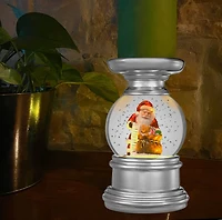Haute Decor Snowburst™ 7" LED Christmas Santa Claus Pillar Candle Holder