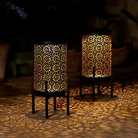 Glitzhome® 14.25" Black Metal Cutout Flower Pattern Solar Powered LED Outdoor Lanterns, 2ct.