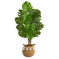 4ft. Monstera Artificial Tree in Boho Chic Handmade Natural Cotton Woven Planter with Tassels UV Resistant (Indoor/Outdoor)