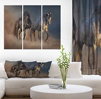 Designart - Black and white horse run