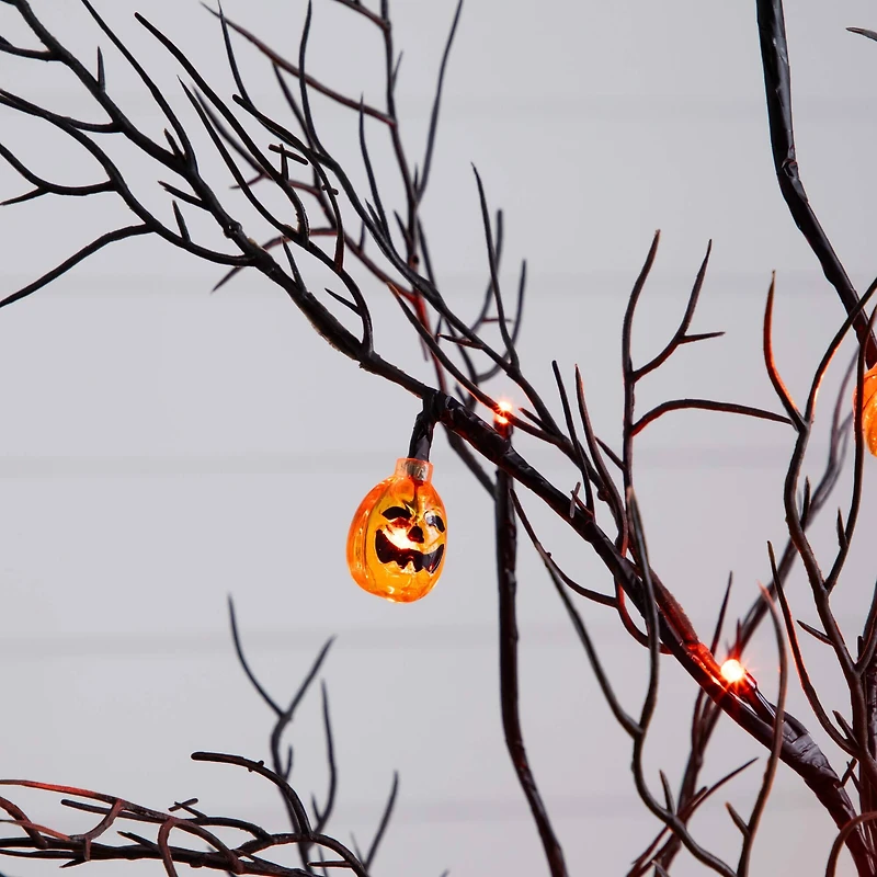 4ft. Pre-Lit Artificial Halloween Black Twig Tree with 24 Orange LED Pumpkin Shaped Lights