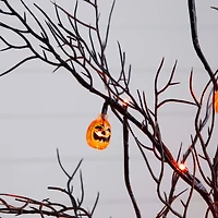 4ft. Pre-Lit Artificial Halloween Black Twig Tree with 24 Orange LED Pumpkin Shaped Lights