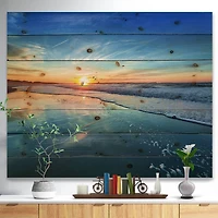 Designart - Blue Seashore with Distant Sunset