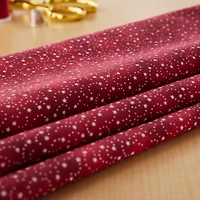 Fabric Traditions Red Swirling Stars Cotton Fabric