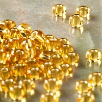 12 Pack: John Bead Topaz Silver Lined Czech Glass Seed Beads, 6/0