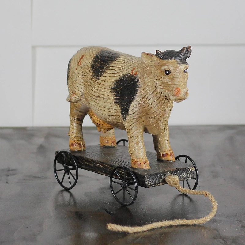 10.25" Black & White Textured Wood Cow on Cart Outdoor Garden Statue