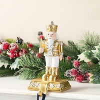 Glitzhome® Christmas Resin Nutcracker Stocking Holder Set