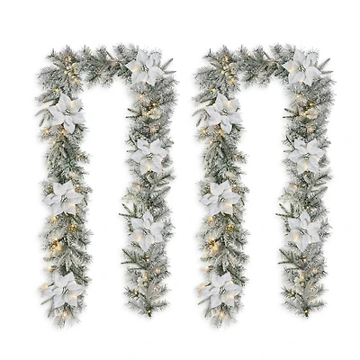 Glitzhome® 9ft. Pre-Lit Snow-Flocked Greenery Pine & Poinsettia Christmas Garlands, 2ct.