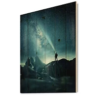 Designart - A Man Shining A Light Into The Night Sky - Modern Print on Natural Pine Wood