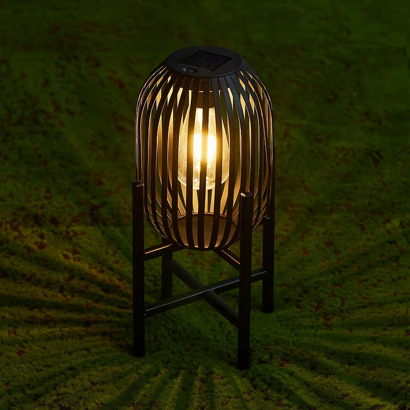 Glitzhome® 14.25" Black Slim Metal Stripes Solar Powered Edison Bulb Outdoor Lantern