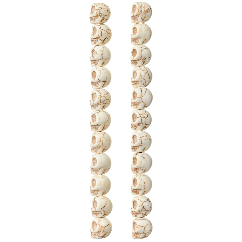 12 Packs: 22 ct. (264 total) White Reconstituted Stone Skull Beads, 15mm by Bead Landing™
