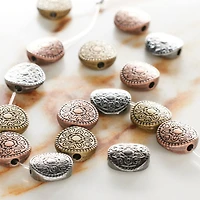 12 Pack:  Carved Metal Round Beads, 10mm by Bead Landing™